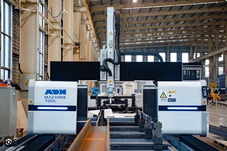 Industrial production machinery inside a furniture factory workshop