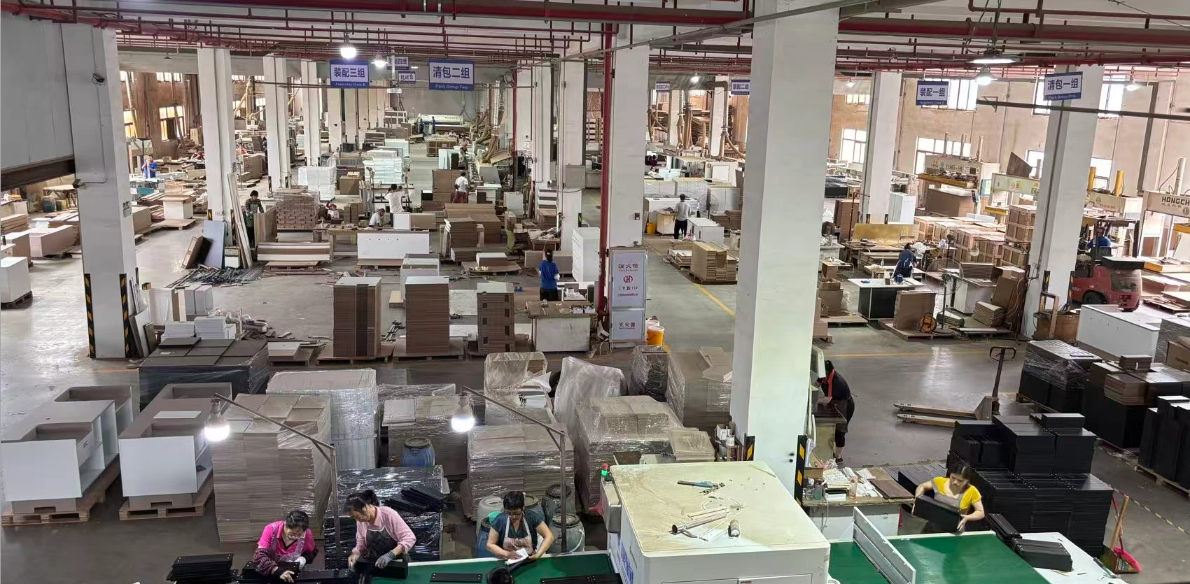 Furniture workshop with workers, workstations and furniture components